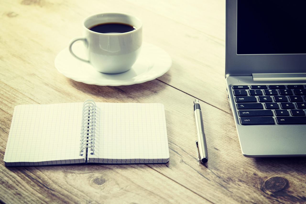 Coffee, computer, cup — DIY Gutter Cleaning Tips: How to Keep Your Gutters Flowing Smoothly